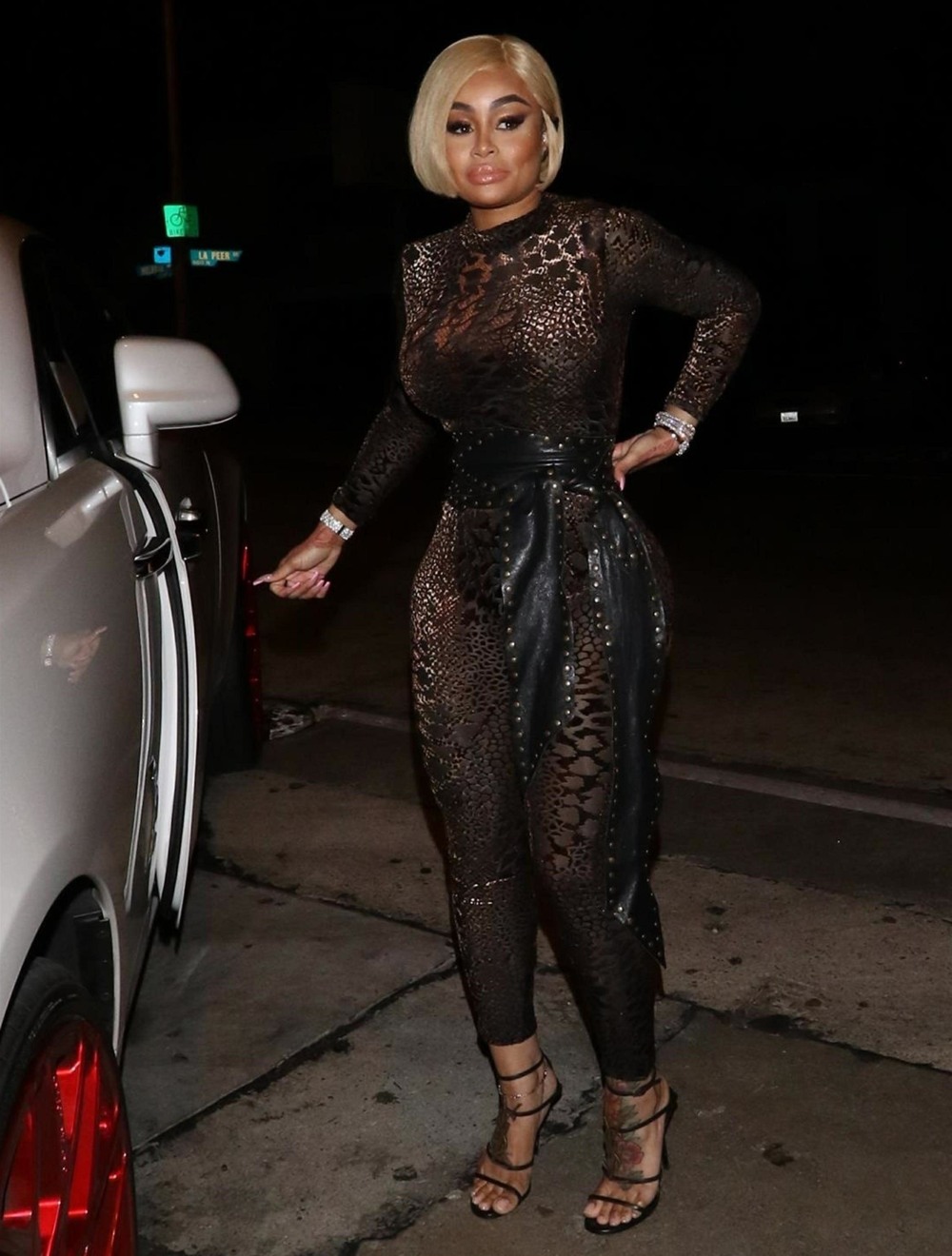 Blac Chyna shows off her curves greeting fans outside Craig's restaurant