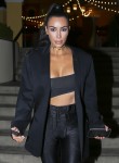 Kim Kardashian bursts out of her top after sushi at Sugarfish