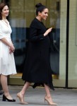 Pregnant Meghan Markle greets members of the public while leaving the Association of Commonwealth Universities in London
