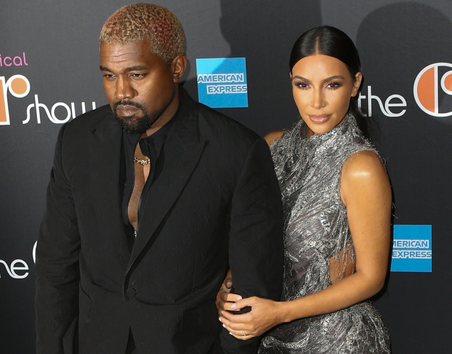 Kim Kardashian and Kanye West arrive on the black carpet at the Cher musical