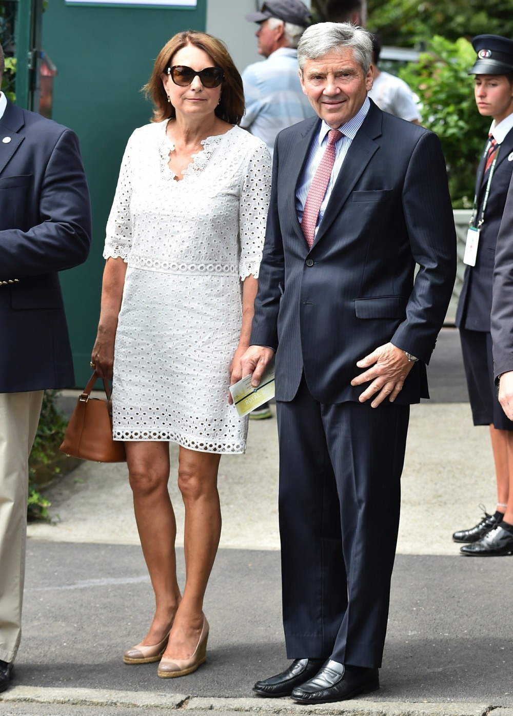 Middletons on the march! Carole and Michael arrive at Wimbledon for day three of the tennis championships