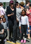 Charlize Theron shops with her kids at the Farmer's Market in Studio City