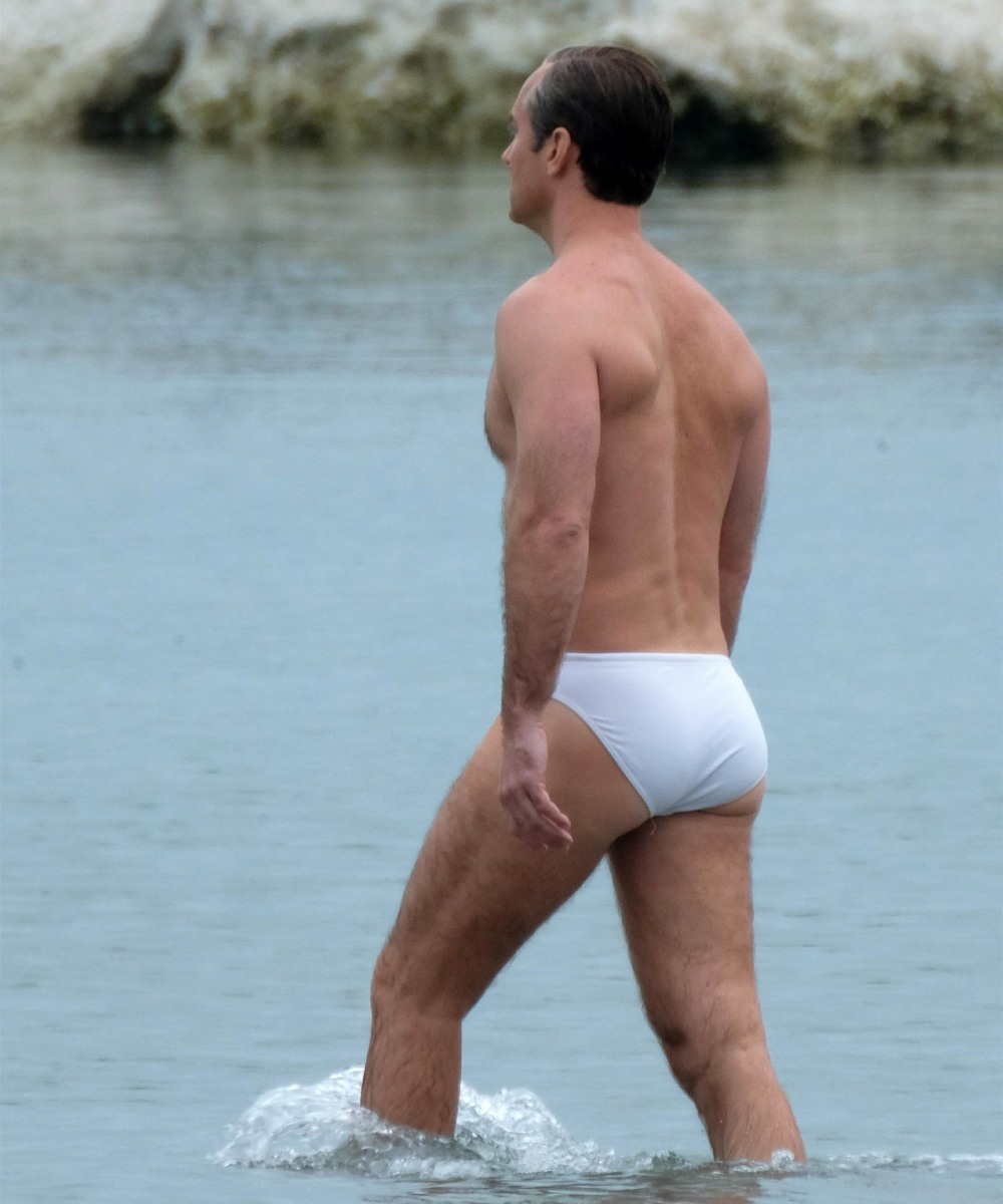 Jude Law shares Venice waters with dozens of naked women (and men) while on the set of 'The New Pope'