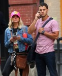 Miranda Lambert and Brendan Mcloughlin are seen hauling luggage leaving their Manhattan apartment