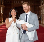 Prince Harry, Duke of Sussex and Meghan, Duchess of Sussex, pose with their newborn son