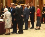 Prince Charles, Prince Harry, Ivanka Trump, Melania Trump, Queen Elizabeth II and Donald Trump view displays of US items from the Royal Collection at Buckingham Palace in London.
