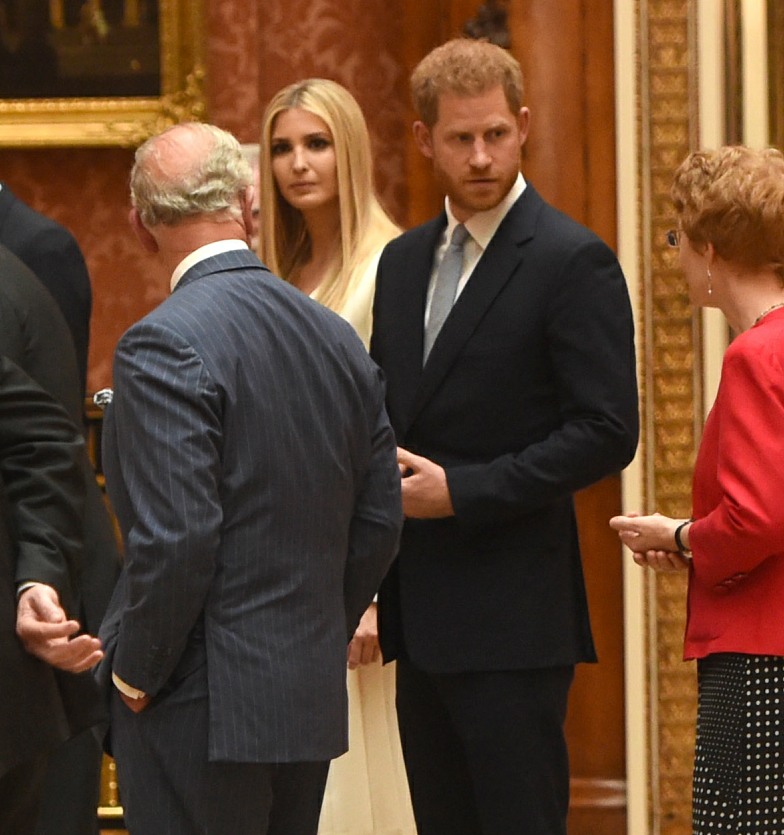 Prince Charles, Prince Harry, Ivanka Trump, Melania Trump, Queen Elizabeth II and Donald Trump view displays of US items from the Royal Collection at Buckingham Palace in London.