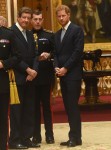 Prince Harry views displays of US items from the Royal Collection at Buckingham Palace in London.