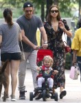 Bradley Cooper and his girlfriend Irina Shayk taking a stroll with their daughter Lea