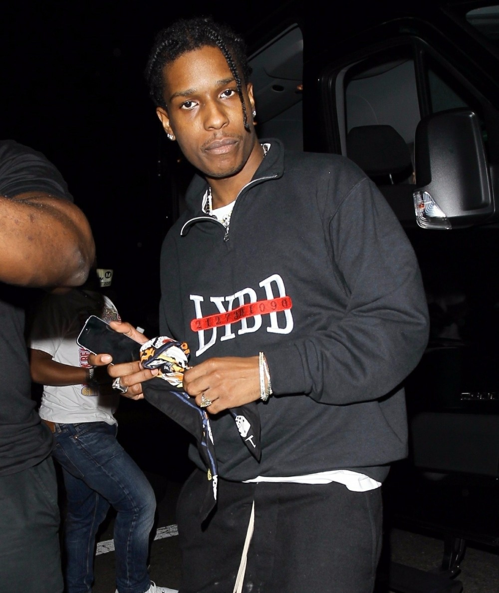 ASAP Rocky dashes out of Kelly Rowland's Halloween party at Poppy