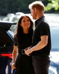 Britain's Prince Harry and Meghan, Duchess of Sussex attend the Boston Red Sox v New York Yankees match in London