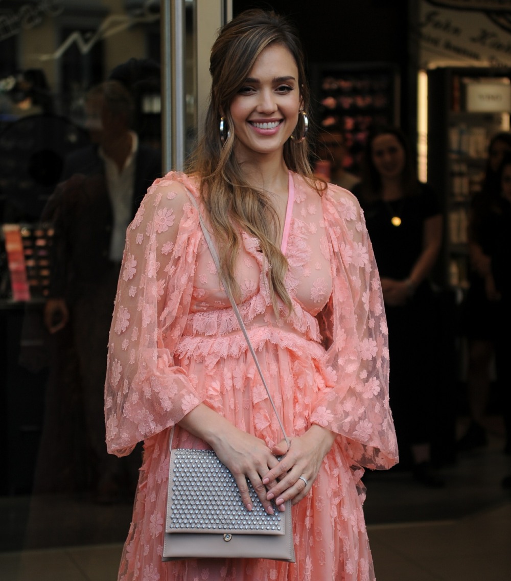 Jessica Alba arrives at an event at the Douglas Perfumery store in Milan