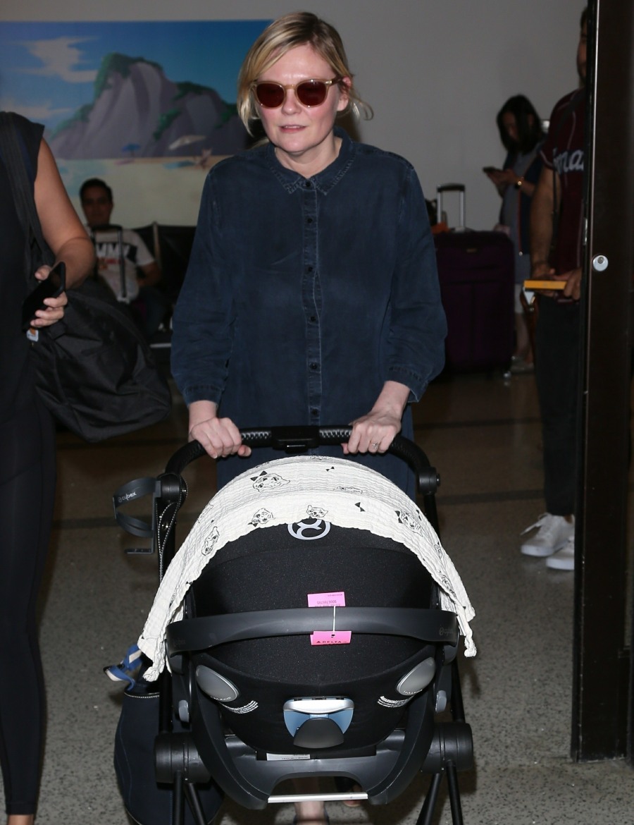 Kirsten Dunst touches down with 2 month old son Ennis at LAX