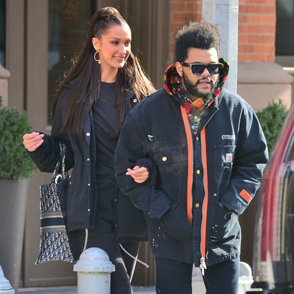 Bella Hadid and The Weeknd are arm in arm as they head to their waiting SUV