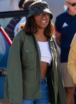 Malia and Sasha Obama enjoy their sunny Saturday going on a stroll to the market while in France!