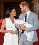 Prince Harry, Duke of Sussex and Meghan, Duchess of Sussex, pose with their newborn son