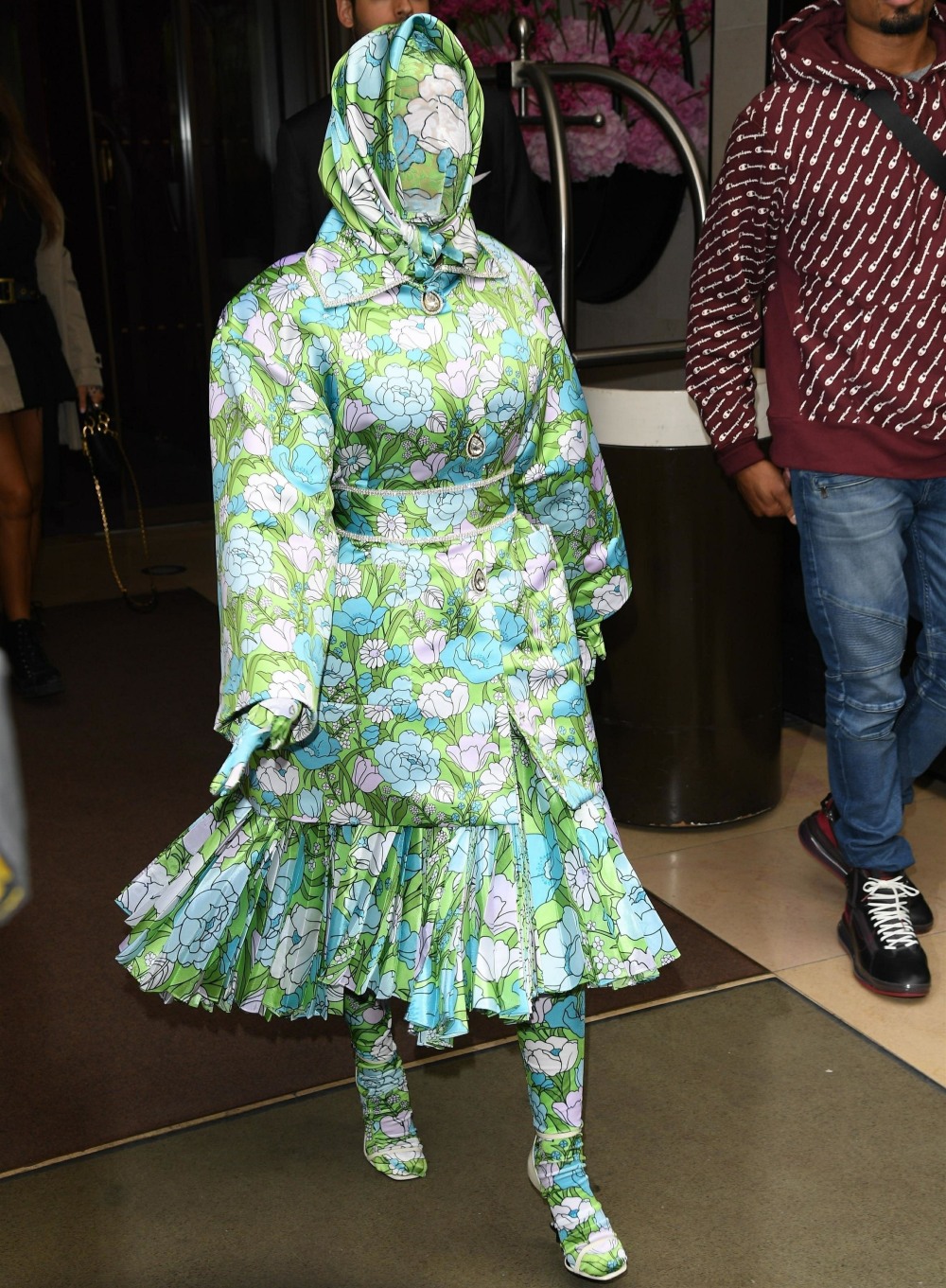 Cardi B leaves her hotel covered head to toe in floral print