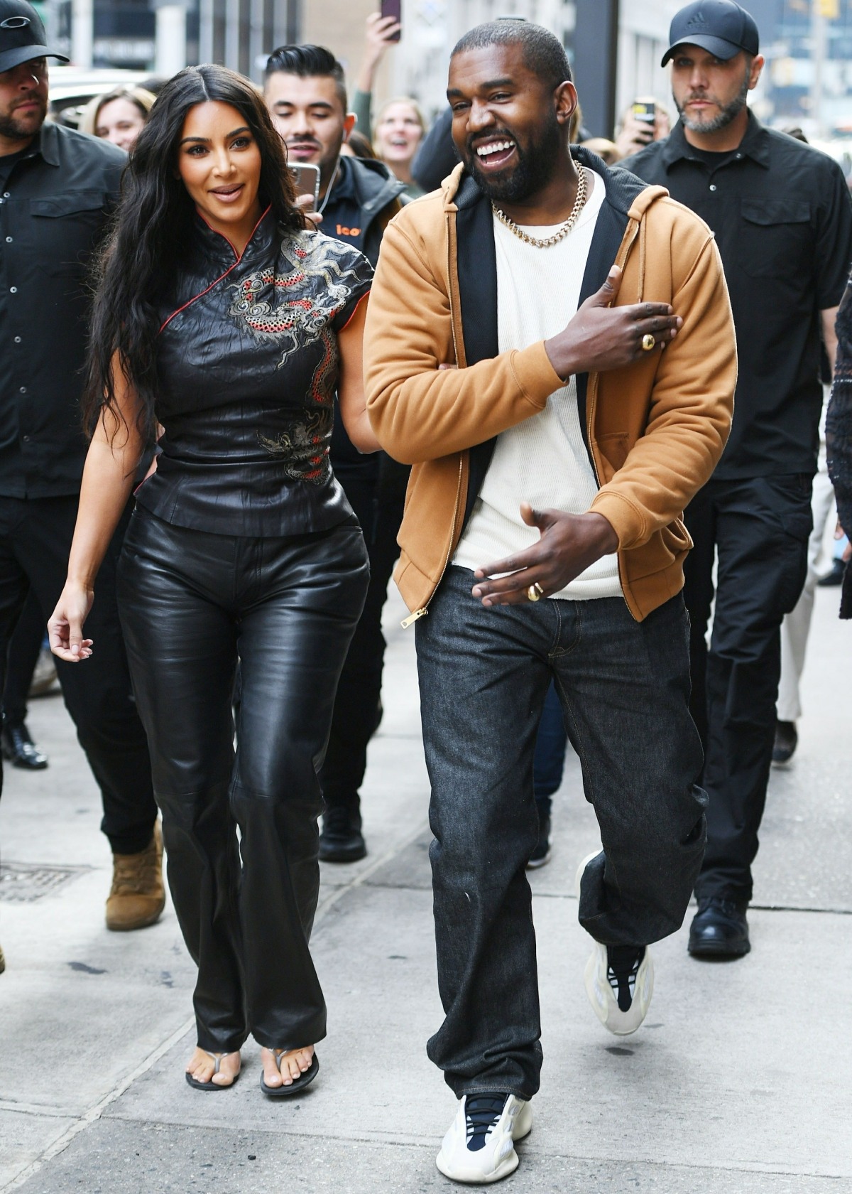 Kim Kardashian and Kanye West cause a frenzy in Midtown as they head to a souvenir shop in New York