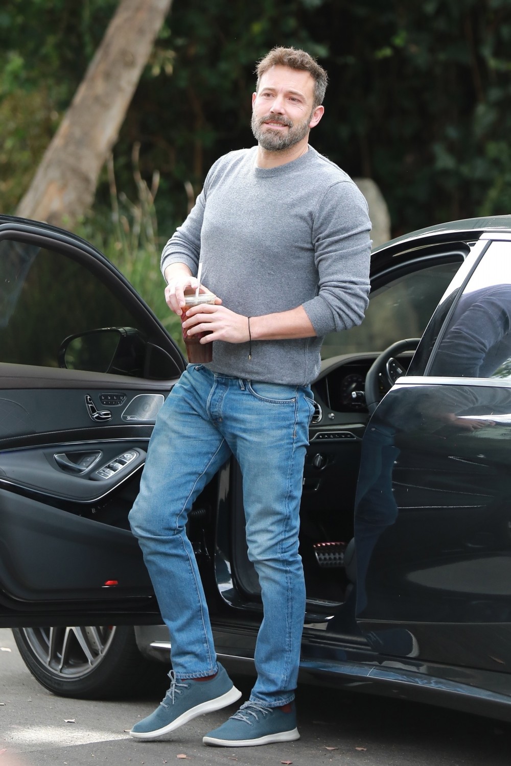 Ben Affleck is in good spirits as he visits Jennifer Garner after a wild night!