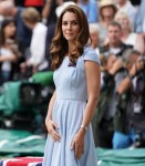 Catherine, Duchess of Cambridge, is accompanied by Prince Edward, Duke of Kent, as she walks onto Centre Court to present the Wimbledon Men's Singles trophy.London, United Kingdom - Sunday July 14th, 2019.