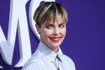 Actress Charlize Theron wearing Dior arrives at the World Premiere Of MGM's 'The Addams Family' held at the Westfield Century City AMC on October 6, 2019 in Century City, Los Angeles, California, United States.