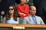 Prince William and Kate Middleton in the stands of the Wimbledon tournament in London