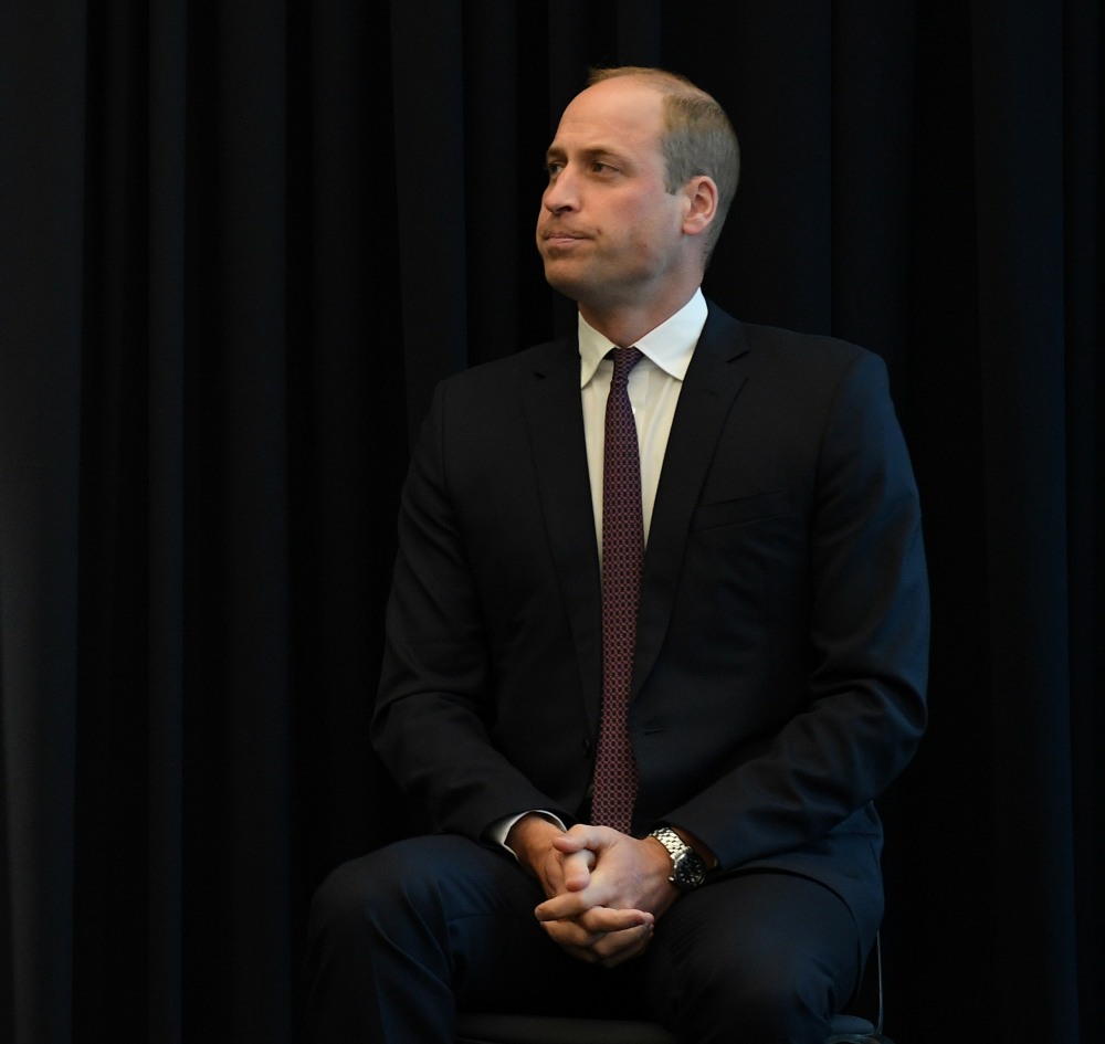 Britain's Prince William, Duke of Cambridge unveils the plaques as he officially opens the new graduate building, the H B Allen Centre, at Keble College, Oxford University in Oxford, central England on October 3, 2019.
