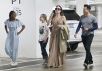 Angelina Jolie shops with her two daughters Vivian and Sahara at the Century City Mall