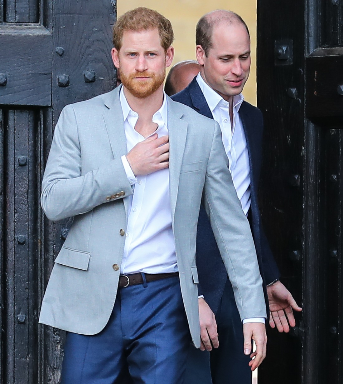 Prince Harry greets the crowds outside Windsor Castle on the evening before his wedding to Meghan Markle