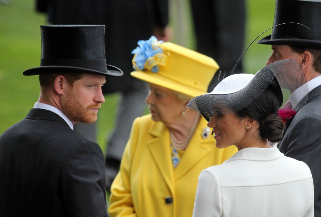 Royal Ascot, Portrait of TRH Prince Harry, the Duke of Sussex and TRH Meghan the Duchess of Sussex in front of HRH Queen Elizabeth the Second