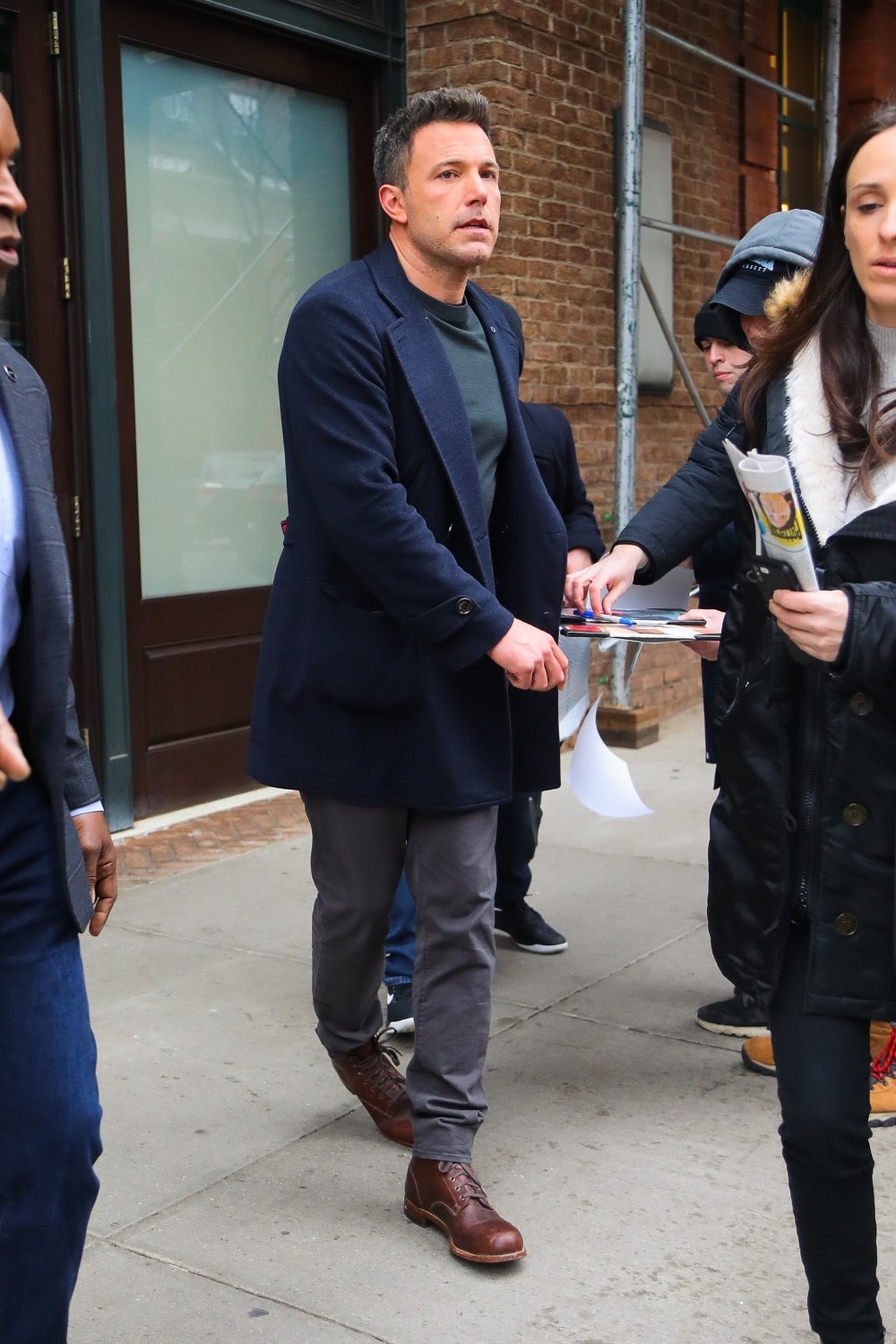 Ben Affleck signs for a few fans leaving The Greenwich Hotel in NYC