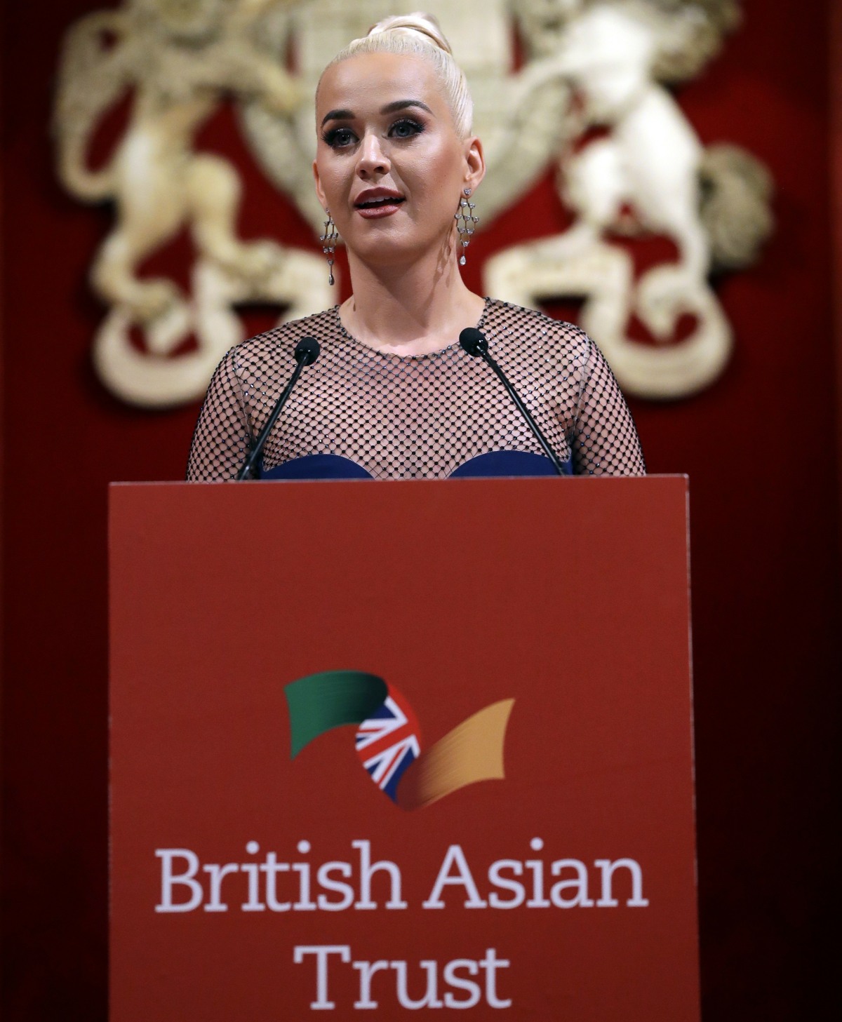 Musician Katy Perry gives a speech as she attends a reception for supporters of the British Asian Trust in London, Tuesday, Feb. 4, 2020.