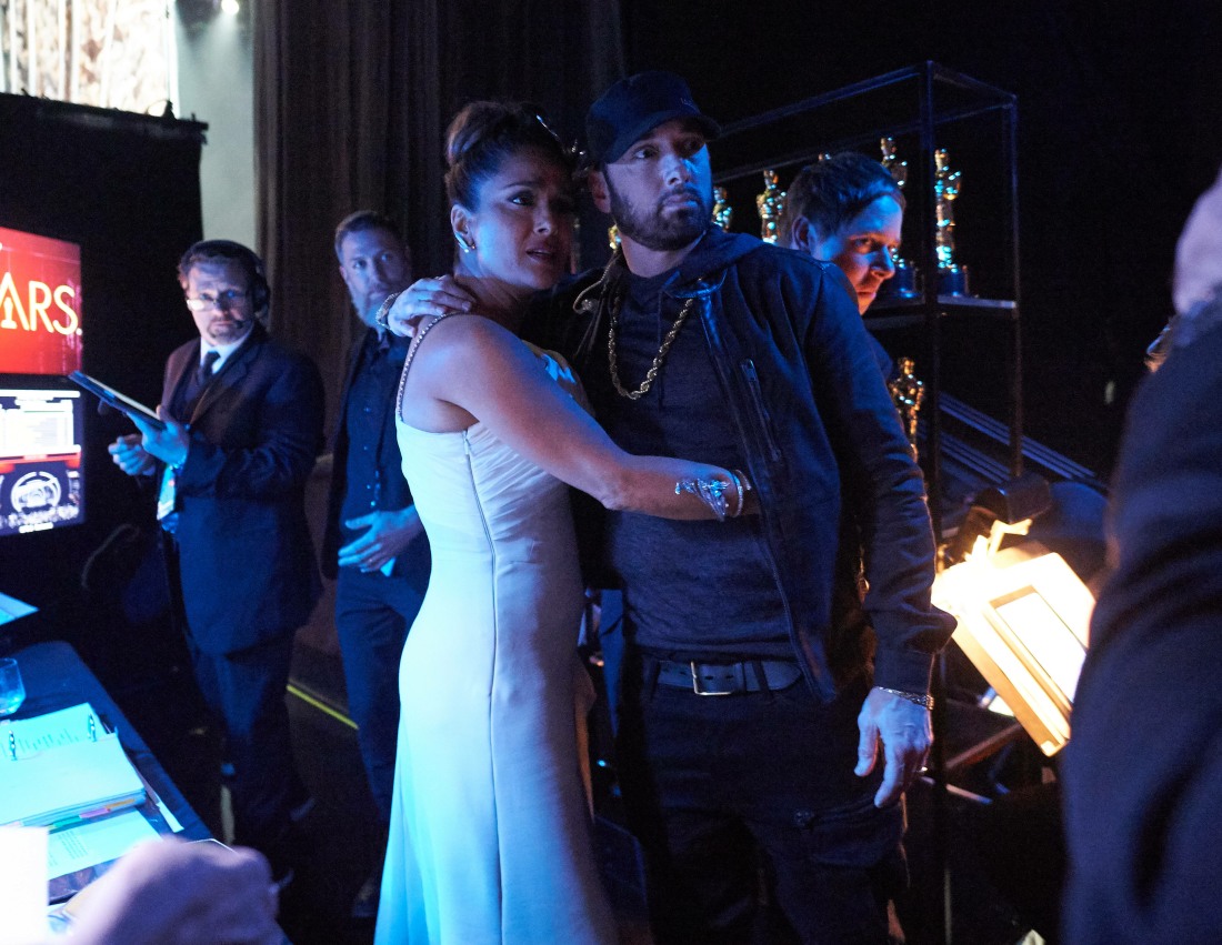Salma Hayek-Pinault hugs Eminem backstage during the live ABC Telecast of The 92nd OscarsÂ® at the D...
