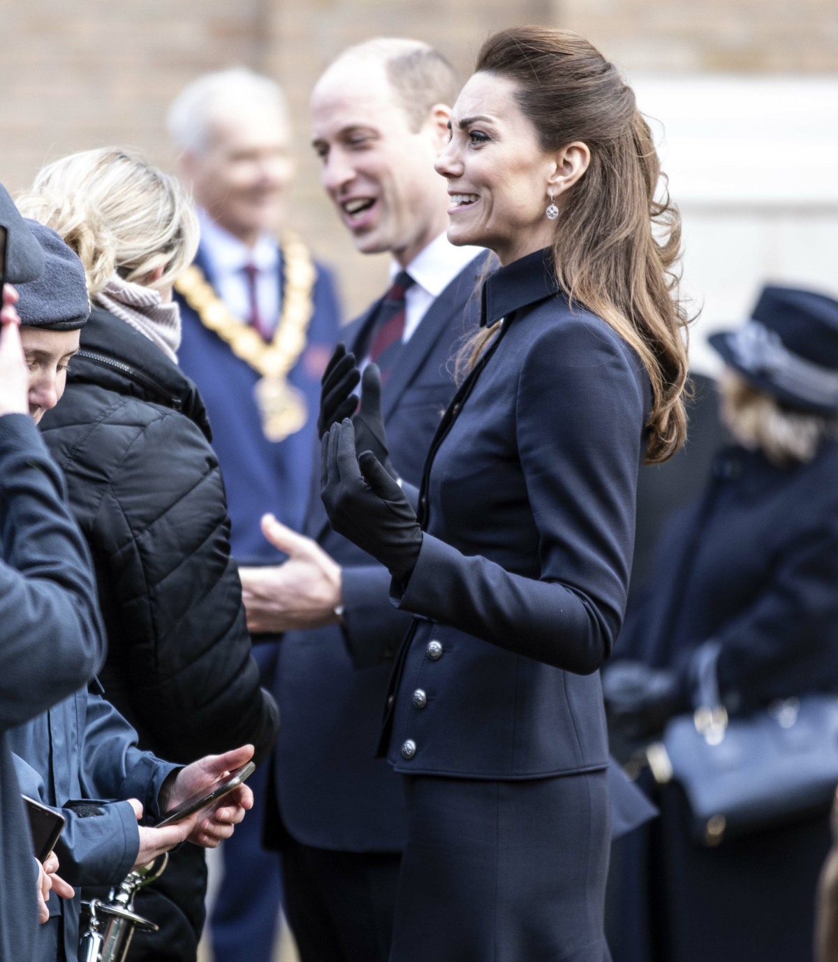 The Duke and Duchess of Cambridge talk to staff and patients during a visit to the defence medical r...
