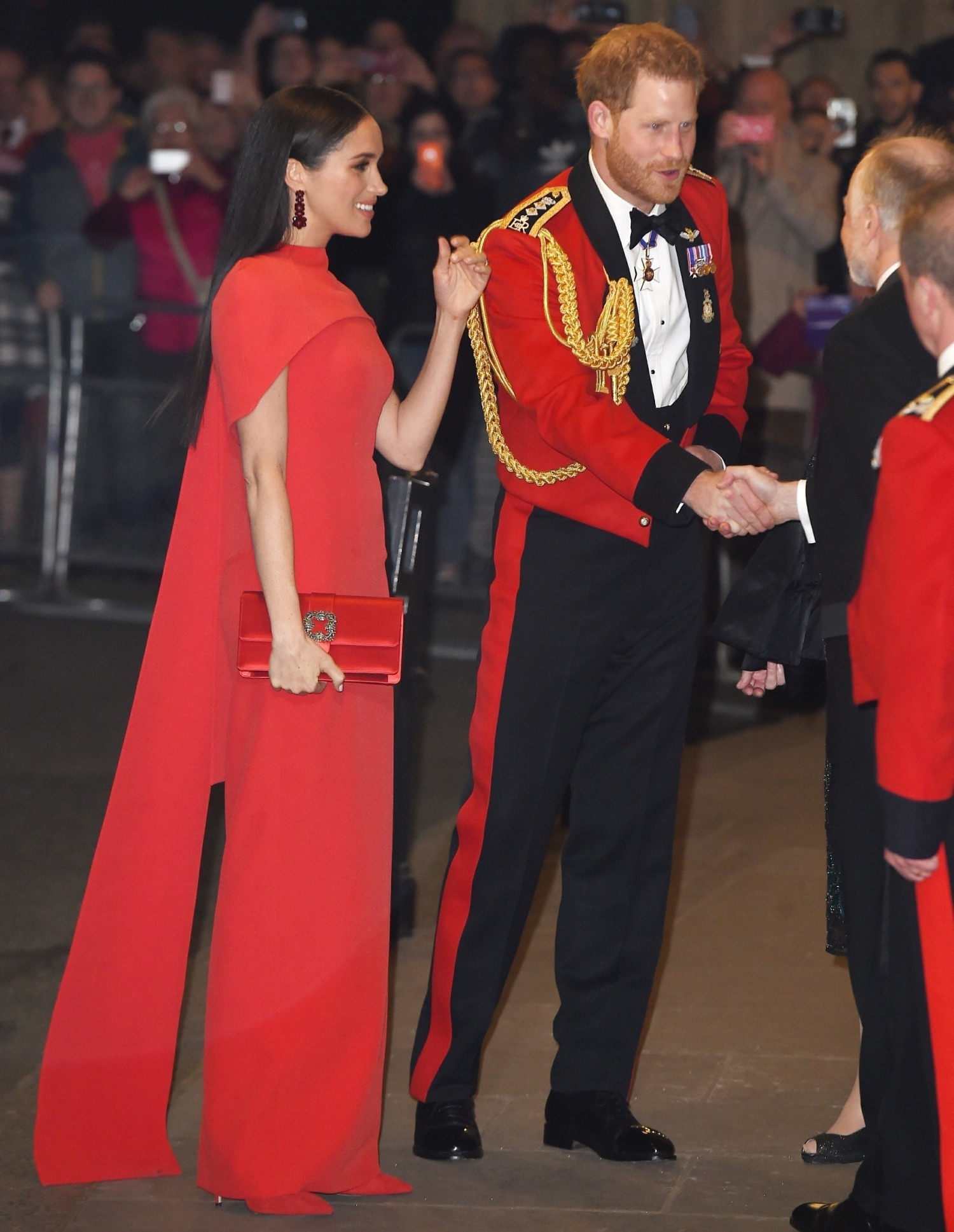 The Duke and Duchess of Sussex are pictured during their arrival at The Mountbatten Festival of Music