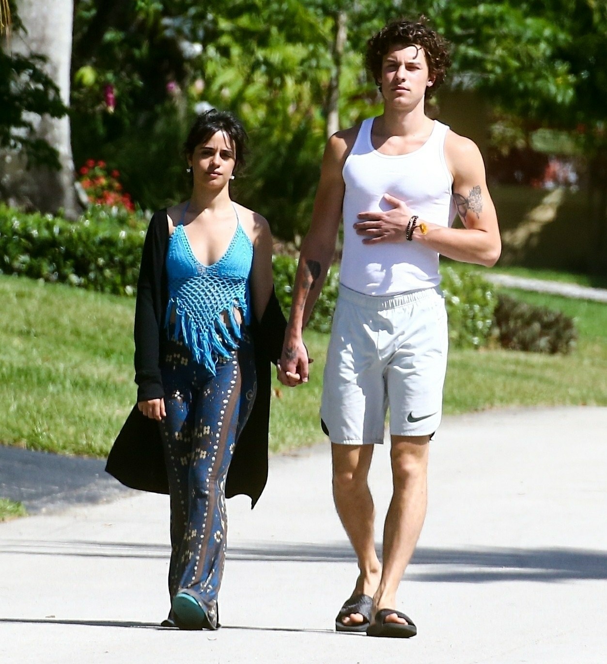 Camila Cabello tries to shake Shawn Mendes awake as couple step out for morning walk WITHOUT their coffee!
