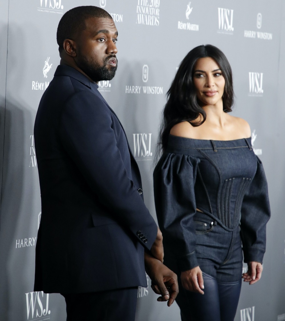 Kim Kardashian and hubby Kanye West pose for a photo at the WSJ Innovator Awards in NYC