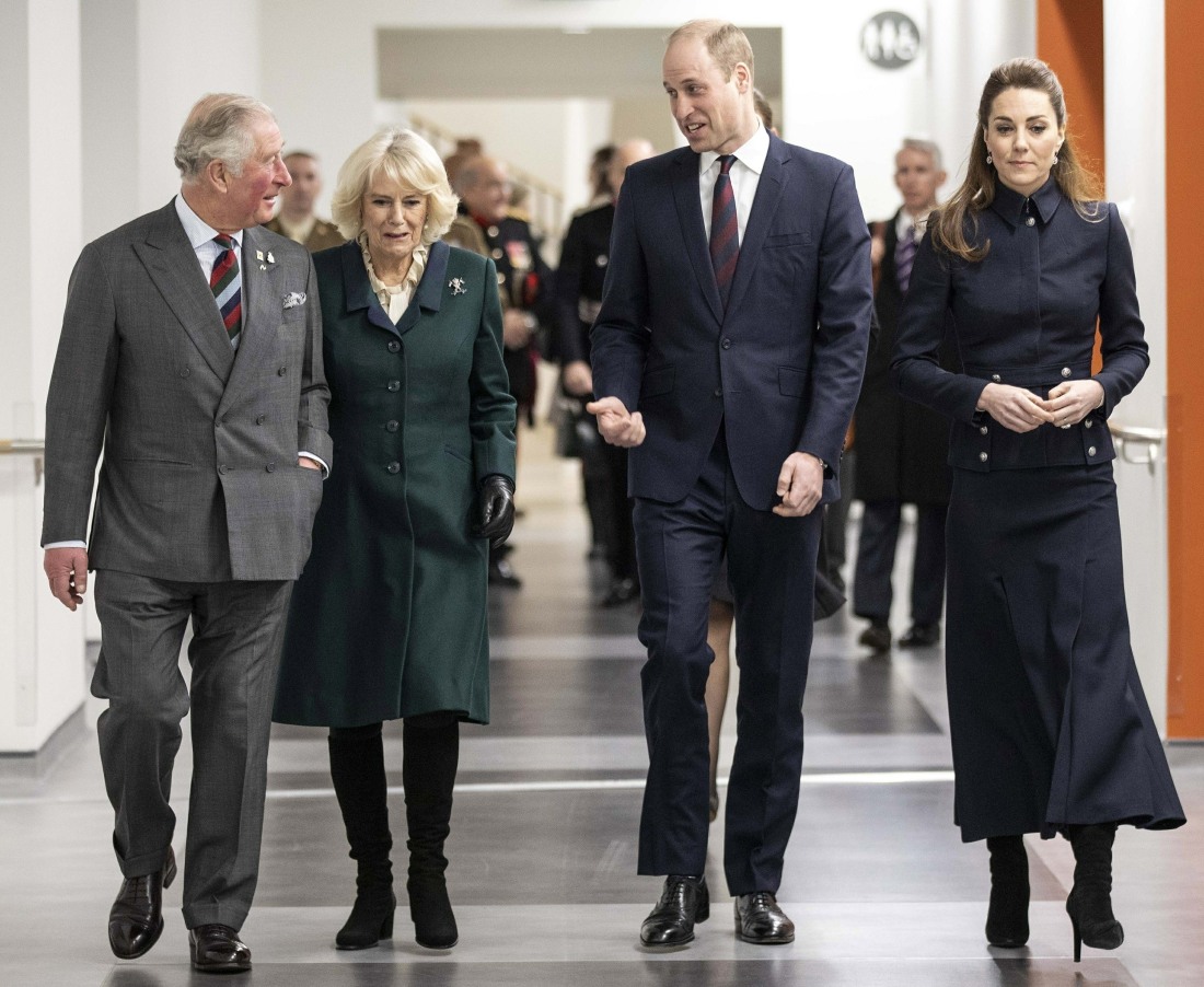 Prince William, Catherine, Prince Charles and his wife Britain's Camilla, during their visit to the Defence Medical Rehabilitation Centre