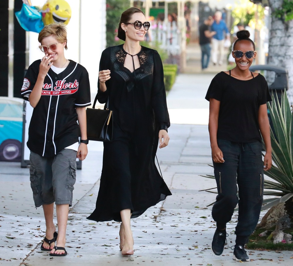 Angelina Jolie takes the girls for some retail therapy at Kitson