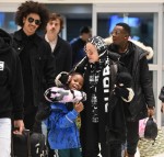 Madonna and boyfriend Ahlamalik Williams arrive at JFK Airport with the kids