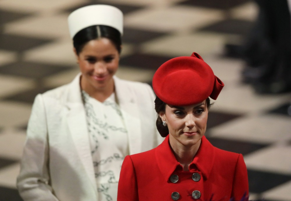 Britain's Kate, Duchess of Cambridge, and Meghan, the Duchess of Sussex leave af