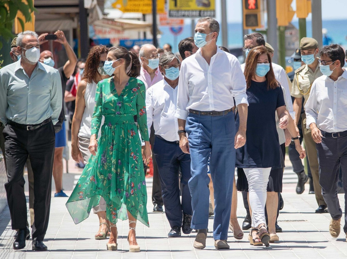 King Felipe of Spain and Queen Letizia of Spain take a walk on promenade of Platja de s'Arenal in Palma de Mallorca