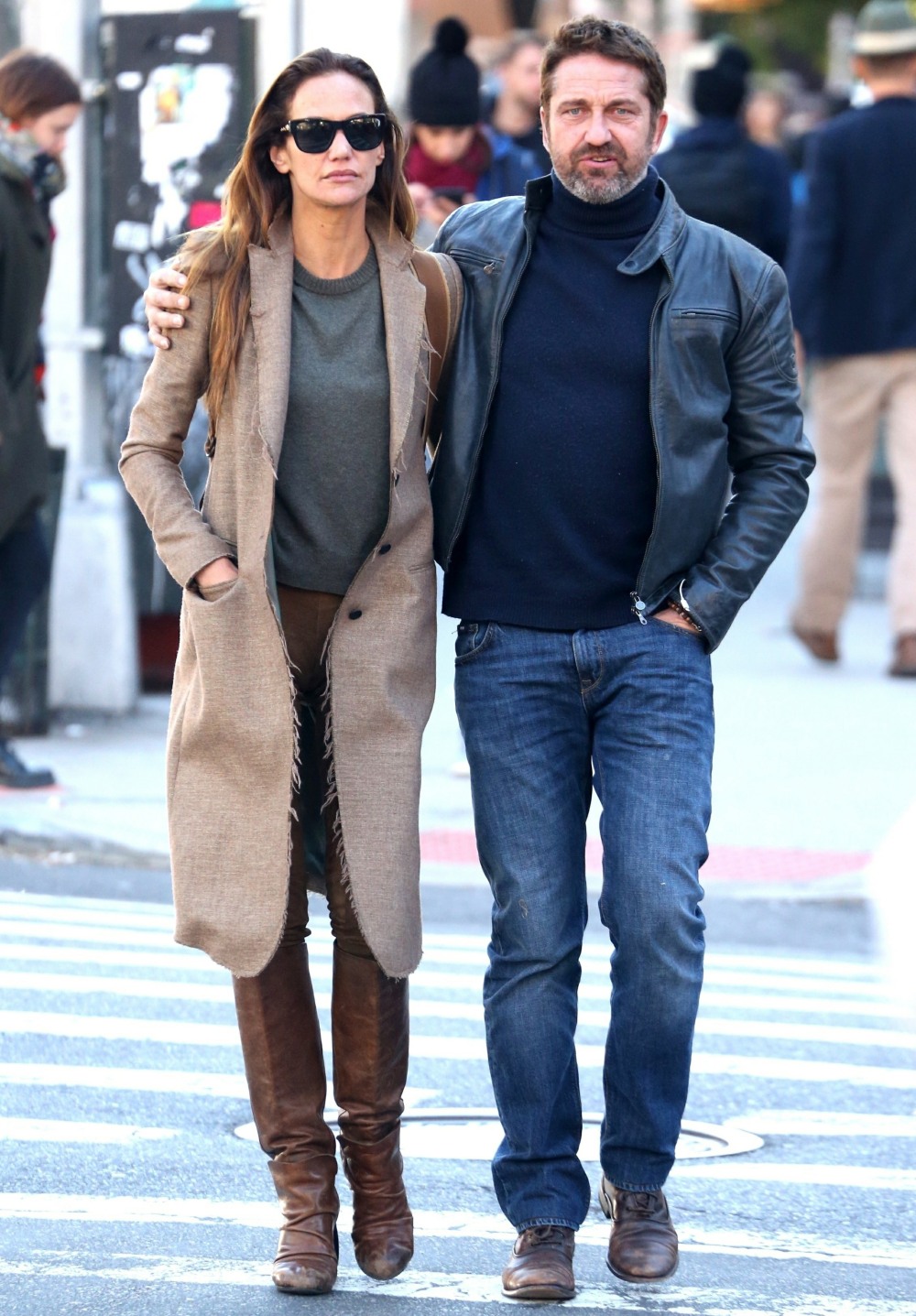 Gerard Butler and Morgan Brown keep each other warm on a chilly NYC walk