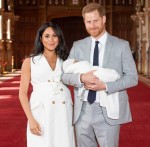 Prince Harry, Duke of Sussex and Meghan, Duchess of Sussex, pose with their newborn son