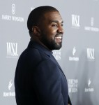 Kim Kardashian and hubby Kanye West pose for a photo at the WSJ Innovator Awards in NYC