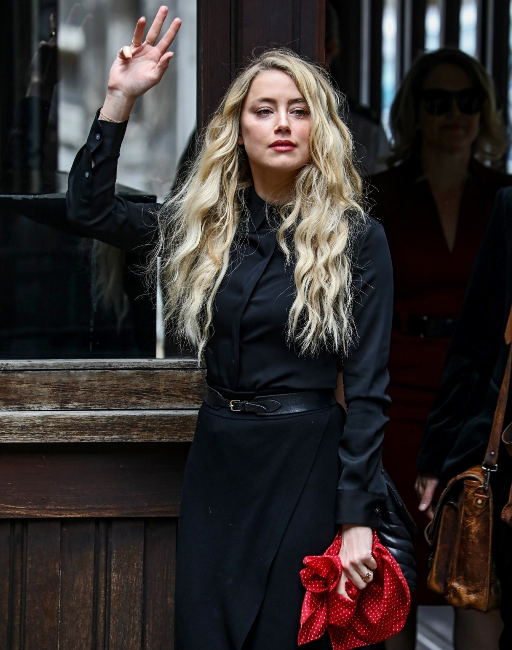 Amber Heard and Johnny Depp arrive for their last day at the Royal Courts of Justice
