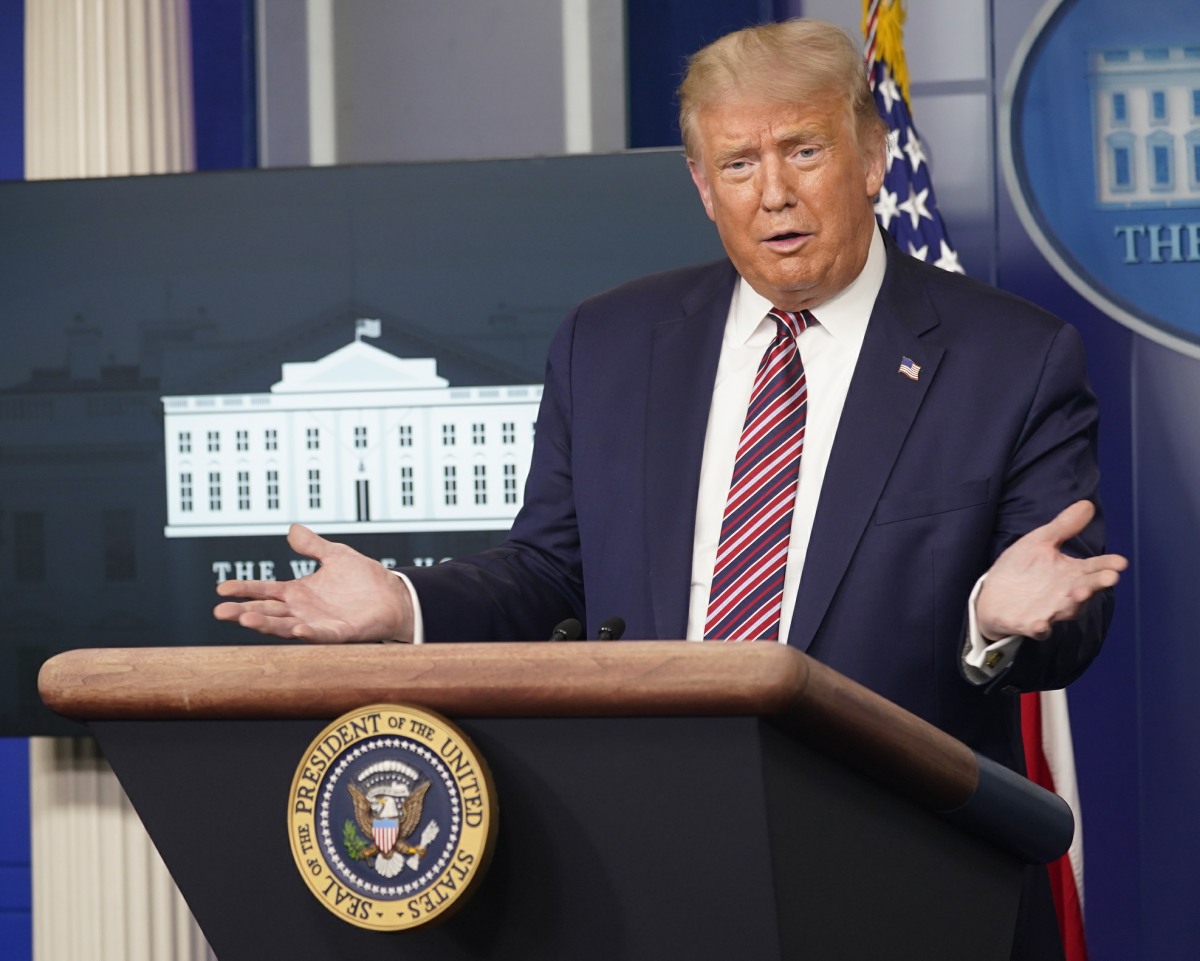 President Donald Trump holds a news briefing