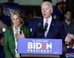 Former Vice President Joe Biden, 2020 Democratic presidential candidate, speaks while his wife Jill...