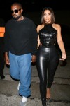 Kanye West and wife Kim Kardashian arrive for a dinner party at Craig's