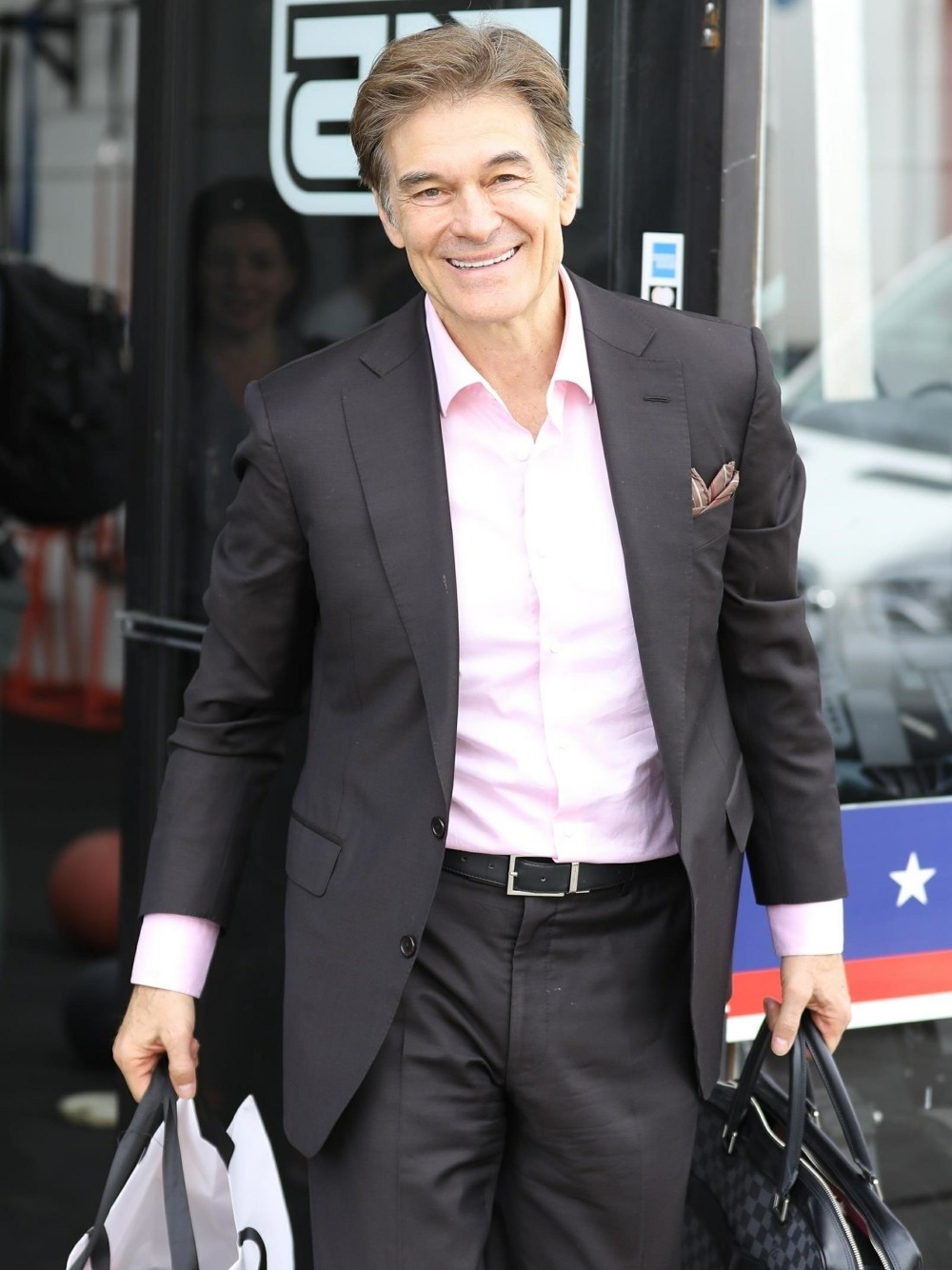 Dr. Oz suits up in style after gym session with Mark Wahlberg!
